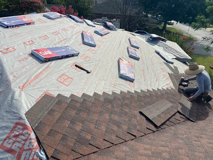 Fox Roofing crew laying GAF architectural shingles on a Texas home tear-off